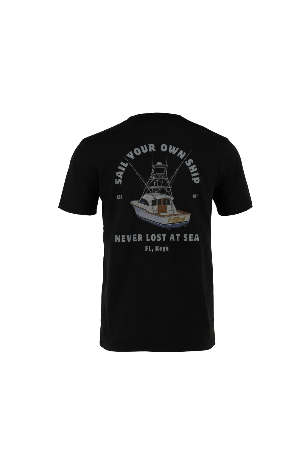 A black short-sleeve t-shirt shown from the back, featuring a graphic print of a fishing boat with the text 'SAIL YOUR OWN SHIP', 'NEVER LOST AT SEA', and 'FL. KEYS' in white and gray.