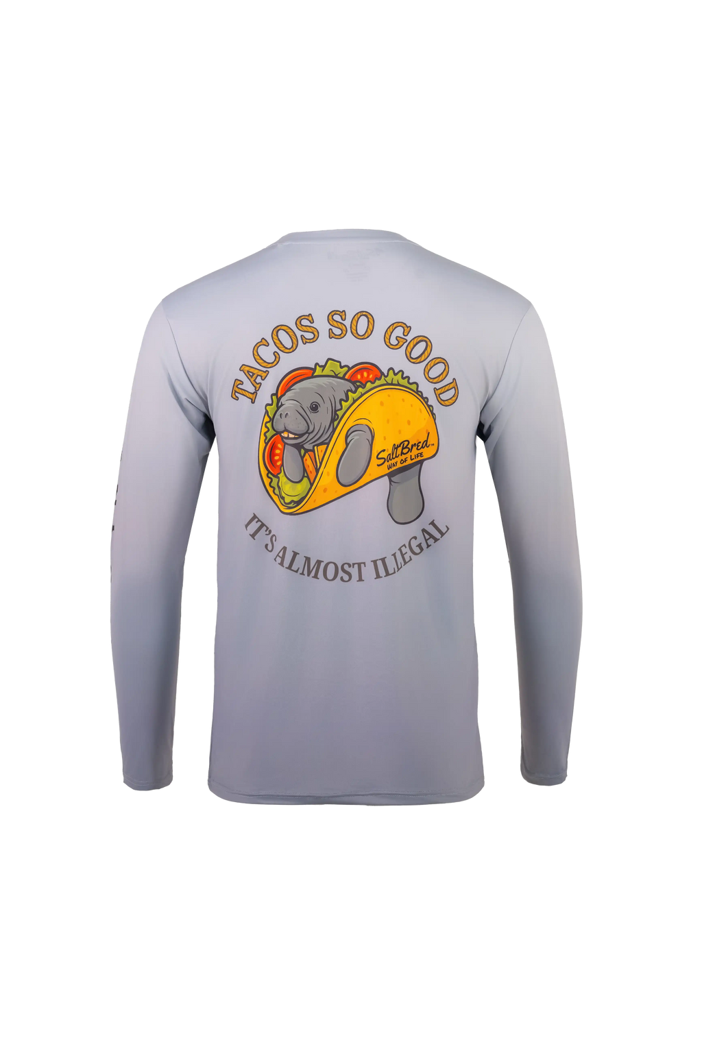 A light gray long-sleeve performance shirt shown from the back, featuring a large graphic of a gray alligator inside a taco with the text 'TACOS SO GOOD' and 'IT'S ALMOST ILLEGAL'.