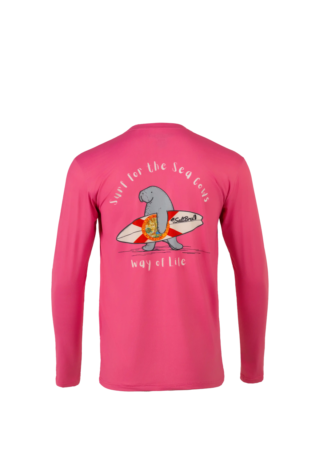 A bright pink long-sleeve shirt shown from the back, featuring a cartoon manatee wearing a red and white surfboard and carrying a shield, with the text 'surf for the sea life' and 'way of life' written around the graphic.