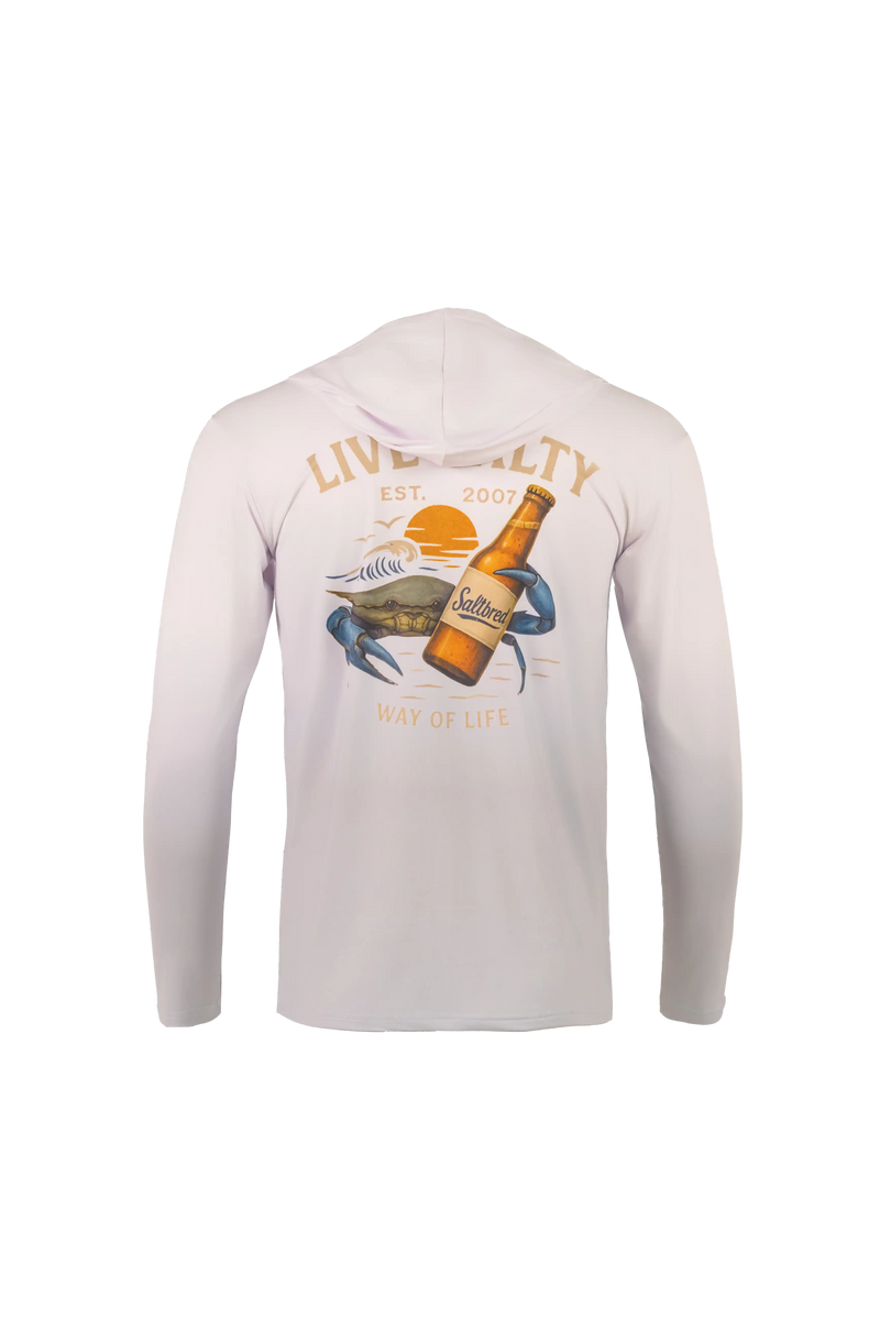 A light pink long-sleeve hoodie shown from the back, featuring a graphic print of a crab, a beer bottle, and a sunset with the text 'LIVE ALIENITY EST. 2007' and 'WAY OF LIFE'.