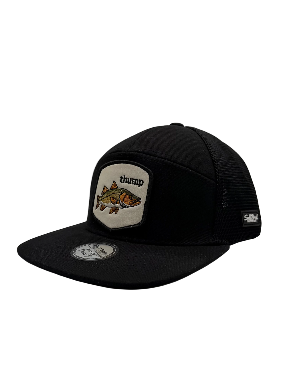 A black trucker-style cap with a flat brim, black mesh back, and a front patch featuring a fish illustration and the word 'thump'.