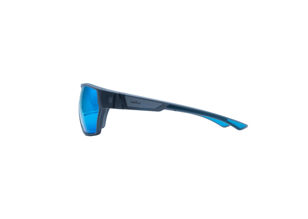 A pair of wraparound sunglasses with a dark gray frame and vibrant blue lenses, shown from a side profile on a solid white background.